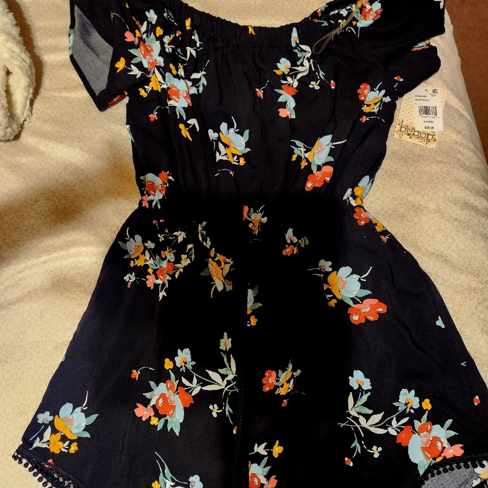 NWT Bebe short jumper. Looks like a short dress but it has shorts